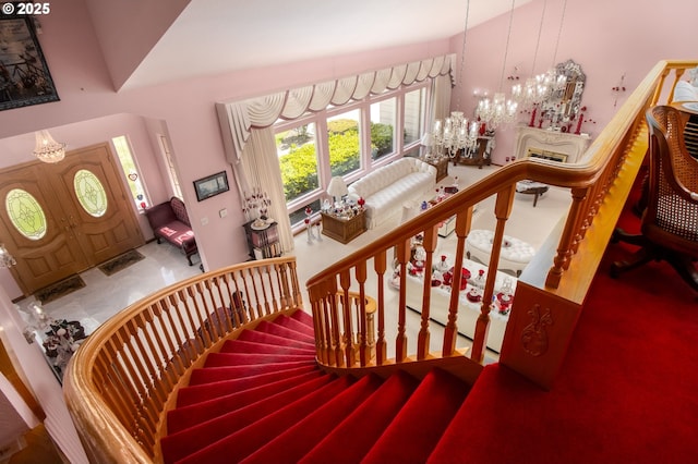 1218 SE Single Tree Dr, Vancouver, WA 98683 - stairs with a chandelier and carpet flooring
