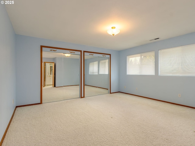1218 SE Single Tree Dr, Vancouver, WA 98683 - unfurnished bedroom with two closets and carpet
