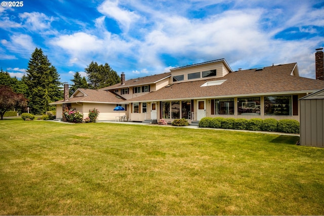 1218 SE Single Tree Dr, Vancouver, WA 98683 - view of front facade featuring a front yard, a chimney, a shingled roof, and covered porch