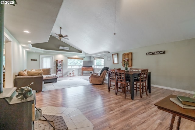 11885 Riverhaven Ln SE, Stayton, OR 97383 - dining space with a ceiling fan, wood finished floors, lofted ceiling, and baseboards