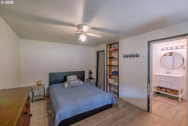 11885 Riverhaven Ln SE, Stayton, OR 97383 - bedroom featuring light wood-type flooring, a sink, a ceiling fan, and ensuite bath