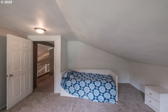 11885 Riverhaven Ln SE, Stayton, OR 97383 - carpeted bedroom featuring lofted ceiling and a textured ceiling