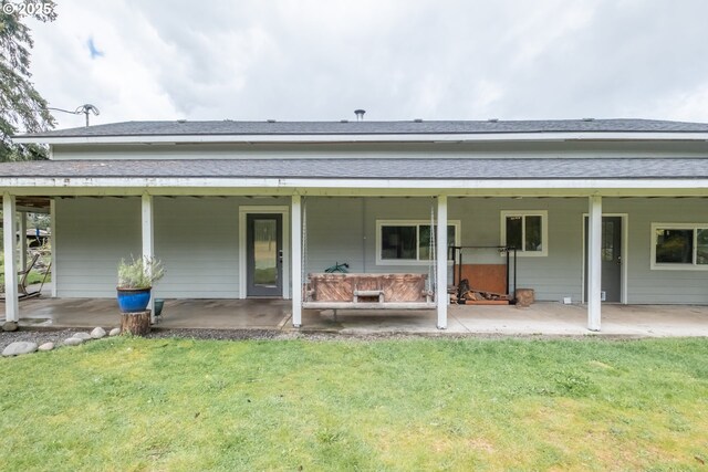 11885 Riverhaven Ln SE, Stayton, OR 97383 - rear view of house featuring a patio, a yard, and a shingled roof