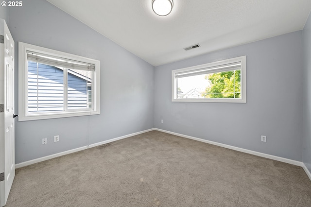3541 SW Wonderview Ave, Gresham, OR 97080 - unfurnished room featuring lofted ceiling, carpet floors, and baseboards