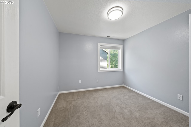 3541 SW Wonderview Ave, Gresham, OR 97080 - spare room featuring carpet, baseboards, and a textured ceiling