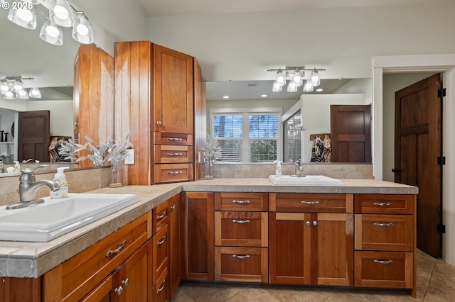 20015 NE 234th St, Battle Ground, WA 98604 - bathroom with double vanity, decorative backsplash, and tile patterned flooring