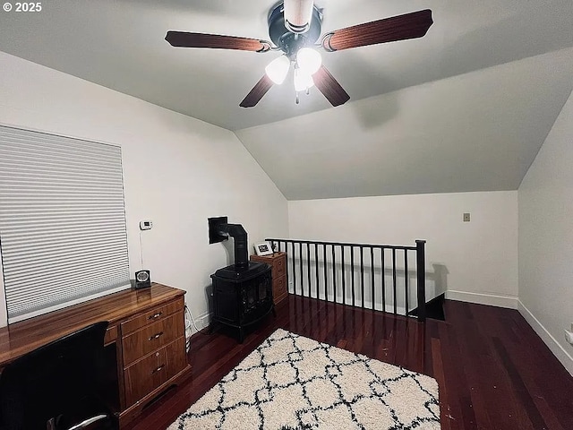 bedroom featuring baseboards, dark wood-style floors, ceiling fan, and lofted ceiling
