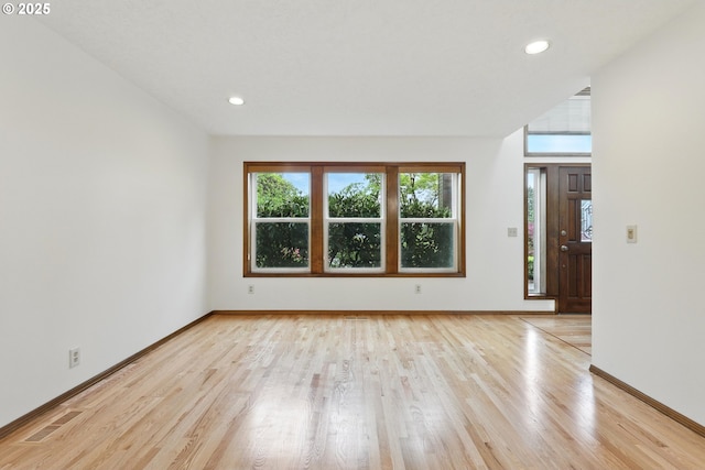1324 Stonehaven Dr, West Linn, OR 97068 - unfurnished living room with light wood finished floors, baseboards, and recessed lighting