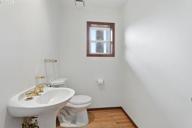 1324 Stonehaven Dr, West Linn, OR 97068 - bathroom with toilet, wood finished floors, baseboards, and a sink