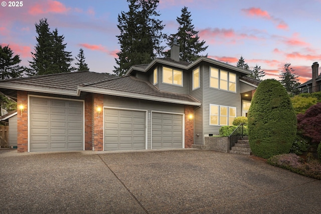 1324 Stonehaven Dr, West Linn, OR 97068 - traditional-style home with concrete driveway, a garage, and a chimney