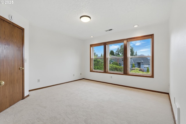 1324 Stonehaven Dr, West Linn, OR 97068 - empty room featuring light carpet, a smoke detector, and baseboards