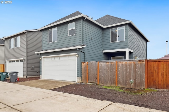 view of front of property with a garage