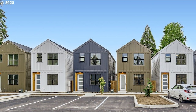 7762 SW Bonita Blvd, Tigard, OR 97224 - view of front facade with board and batten siding and uncovered parking