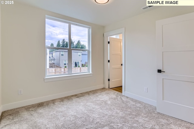 7762 SW Bonita Blvd, Tigard, OR 97224 - unfurnished bedroom with carpet floors, multiple windows, and baseboards
