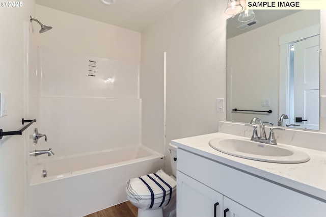 7762 SW Bonita Blvd, Tigard, OR 97224 - bathroom with toilet, vanity, shower / tub combination, and wood finished floors