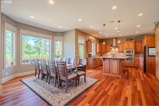 21106 NW 3rd Ct, Ridgefield, WA 98642 - dining room with healthy amount of natural light, light wood-style flooring, and recessed lighting