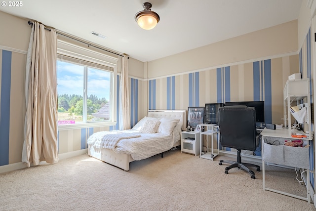 21106 NW 3rd Ct, Ridgefield, WA 98642 - bedroom with carpet flooring, a desk, and wallpapered walls
