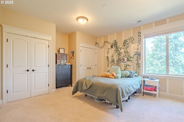 21106 NW 3rd Ct, Ridgefield, WA 98642 - carpeted bedroom with two closets and baseboards
