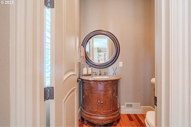 21106 NW 3rd Ct, Ridgefield, WA 98642 - bathroom with vanity, wood finished floors, and healthy amount of natural light