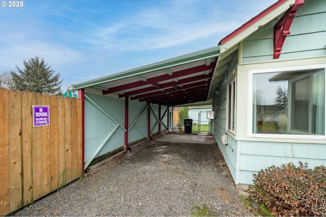 view of parking featuring a carport