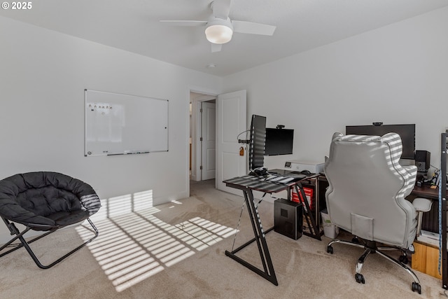 office with light colored carpet and ceiling fan