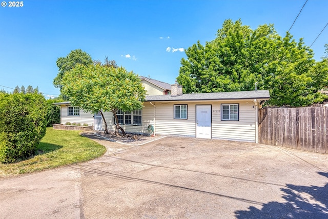 22692 SW Highland Dr, Sherwood, OR 97140 - view of front facade with a chimney, a patio, and concrete driveway