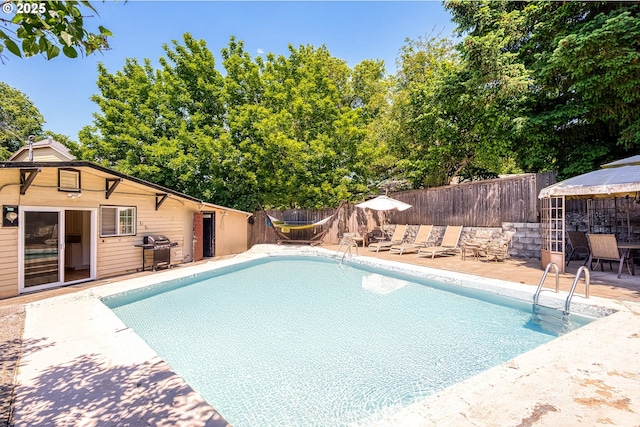 22692 SW Highland Dr, Sherwood, OR 97140 - view of pool featuring area for grilling, a fenced backyard, and a patio area