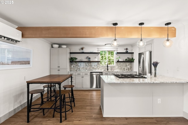22692 SW Highland Dr, Sherwood, OR 97140 - kitchen featuring stainless steel appliances, open shelves, a peninsula, and white cabinets