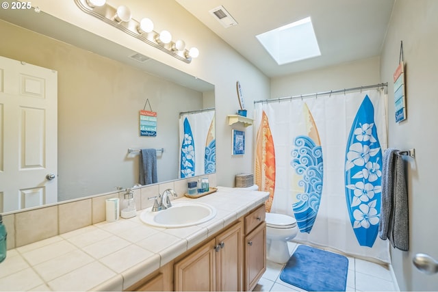 11433 SE Bethany Dr, Happy Valley, OR 97086 - full bath featuring a skylight, vanity, tile patterned flooring, and shower / bath combo with shower curtain