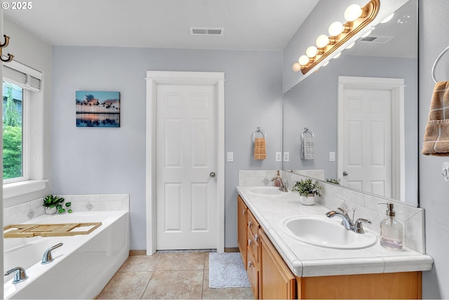 11433 SE Bethany Dr, Happy Valley, OR 97086 - full bath with double vanity, a bath, and tile patterned floors