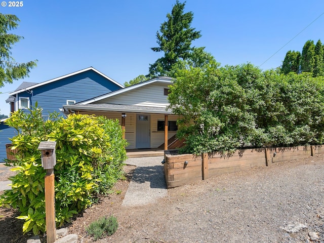 6310 SW 35th Ave, Portland, OR 97221 - bungalow-style home with a porch