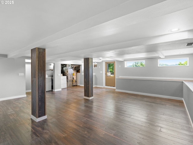 6310 SW 35th Ave, Portland, OR 97221 - basement featuring washer / clothes dryer and wood finished floors