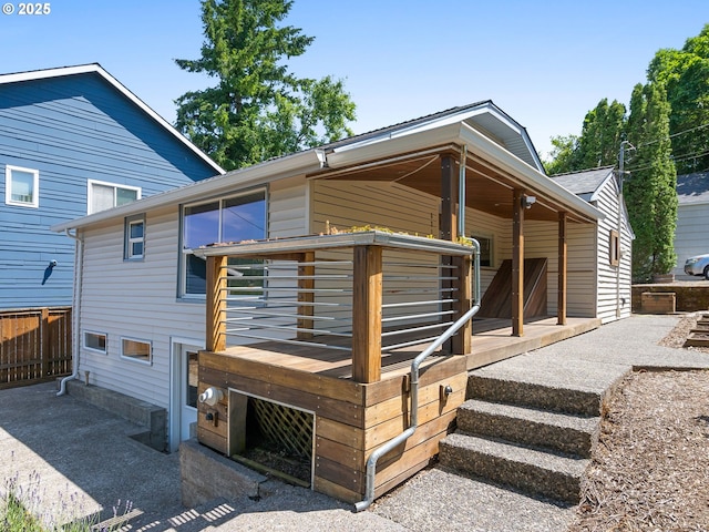 6310 SW 35th Ave, Portland, OR 97221 - rear view of house featuring a deck