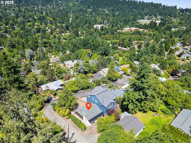 6310 SW 35th Ave, Portland, OR 97221 - aerial view of property's location featuring a forest and nearby suburban area