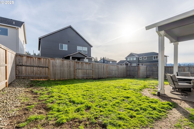 view of yard featuring a fenced backyard