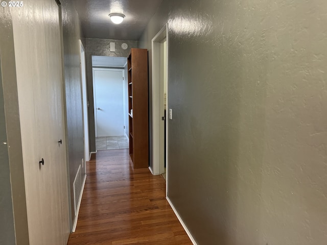 611 Fairchild St, Canyonville, OR 97417 - corridor featuring wood finished floors and baseboards