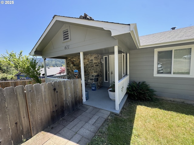 611 Fairchild St, Canyonville, OR 97417 - view of home's exterior with a shingled roof and covered porch