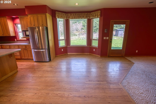 1317 Riggleman Ln, White Salmon, WA 98672 - kitchen with stainless steel appliances, baseboards, plenty of natural light, light wood finished floors, and recessed lighting