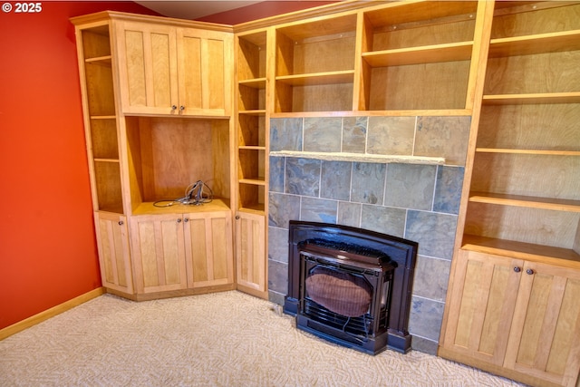 1317 Riggleman Ln, White Salmon, WA 98672 - detailed view of carpet flooring, a wood stove, and baseboards