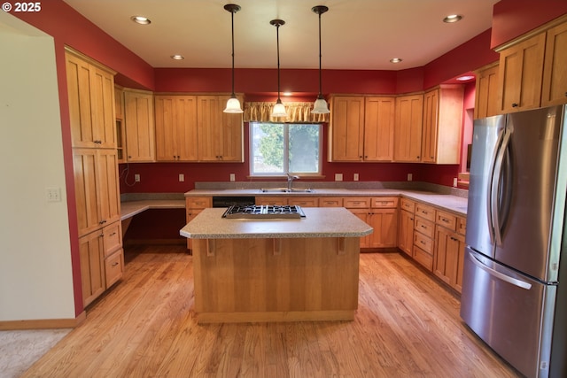 1317 Riggleman Ln, White Salmon, WA 98672 - kitchen featuring appliances with stainless steel finishes, a sink, light wood-type flooring, a center island, and recessed lighting