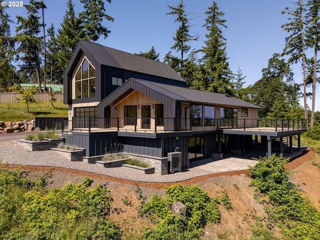 11625 NE Hoskins Hill Rd, Newberg, OR 97132 - back of property with a patio, a deck, and a shingled roof