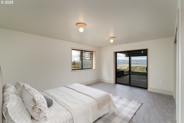 11625 NE Hoskins Hill Rd, Newberg, OR 97132 - bedroom featuring access to exterior, baseboards, and light tile patterned flooring