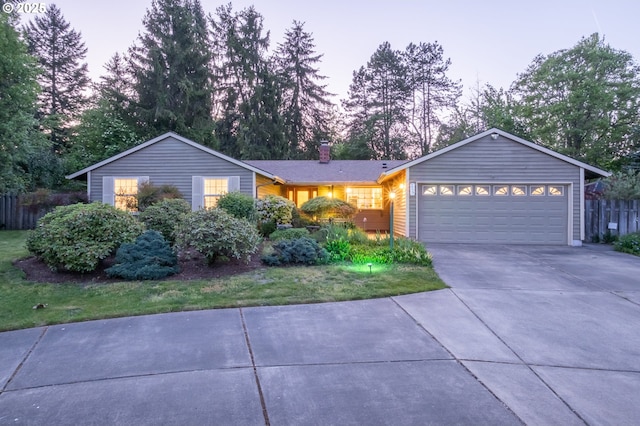 3727 NW Arrowood Cir, Corvallis, OR 97330 - ranch-style home with a chimney, driveway, an attached garage, and fence