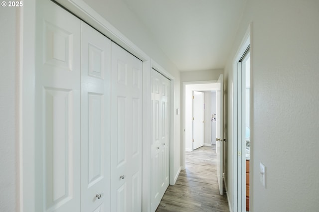 3727 NW Arrowood Cir, Corvallis, OR 97330 - hallway featuring wood finished floors and baseboards