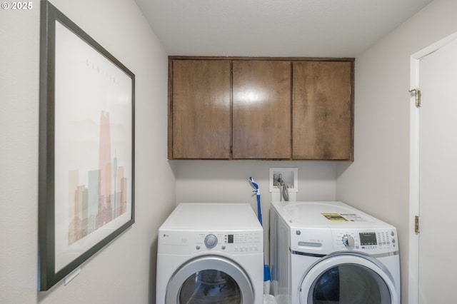 3727 NW Arrowood Cir, Corvallis, OR 97330 - clothes washing area with washer and clothes dryer and cabinet space