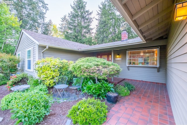 3727 NW Arrowood Cir, Corvallis, OR 97330 - view of side of property with a chimney and a patio area