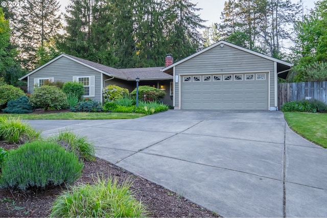 3727 NW Arrowood Cir, Corvallis, OR 97330 - ranch-style house featuring fence, concrete driveway, and a chimney