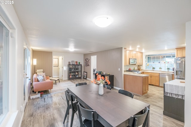 3727 NW Arrowood Cir, Corvallis, OR 97330 - dining area with light wood-type flooring and baseboards