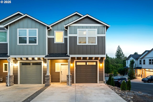 2360 N R St, Washougal, WA 98671 - view of front of home with driveway, an attached garage, and board and batten siding