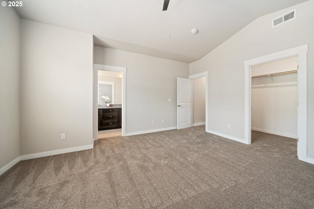 2360 N R St, Washougal, WA 98671 - unfurnished bedroom featuring vaulted ceiling, carpet floors, a spacious closet, a closet, and ensuite bathroom